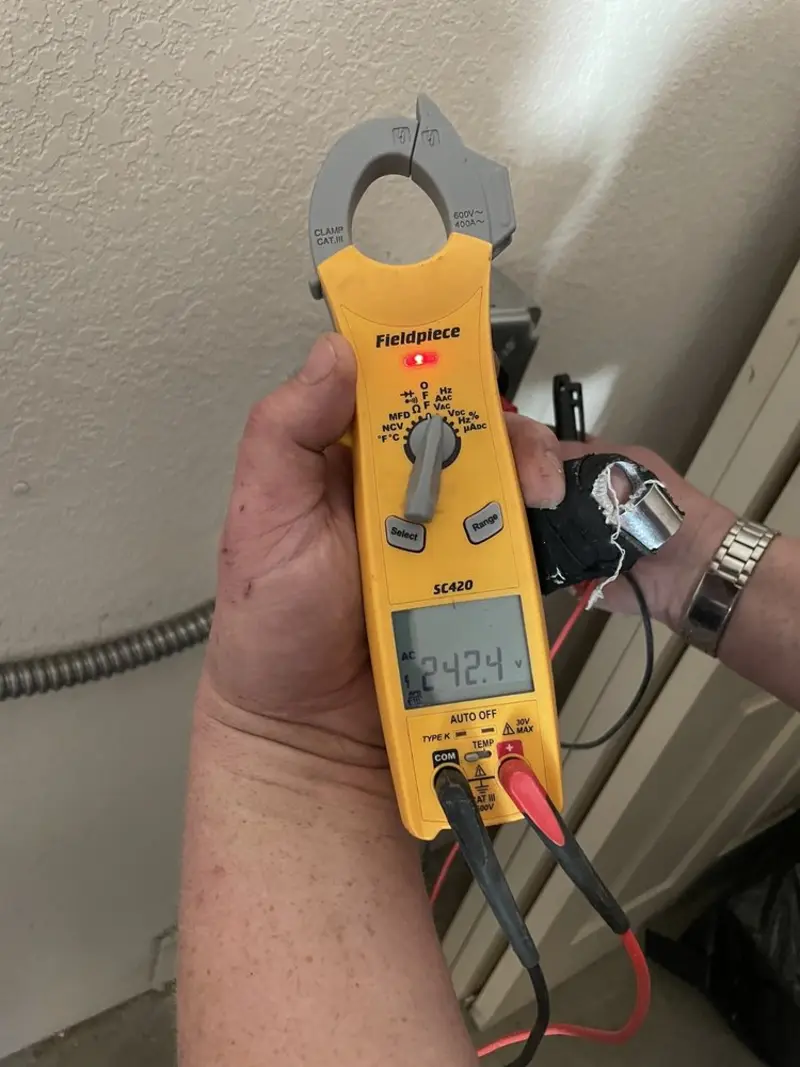 Voltage testing with clamp meter during Generator Installation in Hudsonville